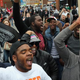 Baltimore residents celebrate at the corner of West North and Pennsylvania avenues after the Baltimore state’s attorney announced charges brought against six police officers in the death of Freddie Gray May 1, 2015.
Win McNamee/Getty Images
